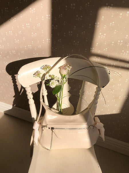 [ovuni] BELTED RIBBON BAG CREAM