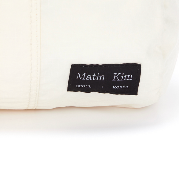 [Matin Kim] LOGO SPORTY DUFFEL BAG IN IVORY