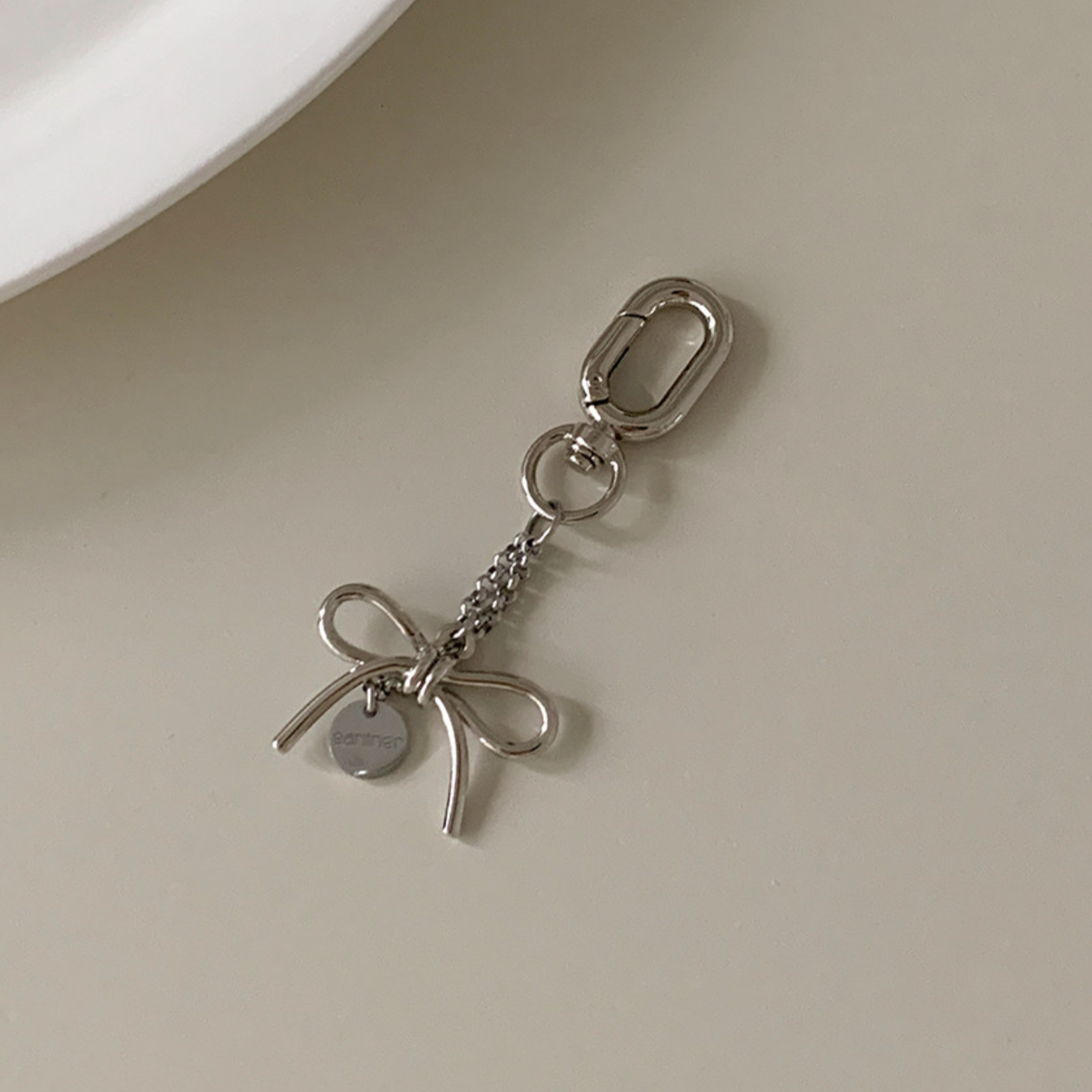 [earliner] Handmade Mini Silver Ribbon Logo Keyring