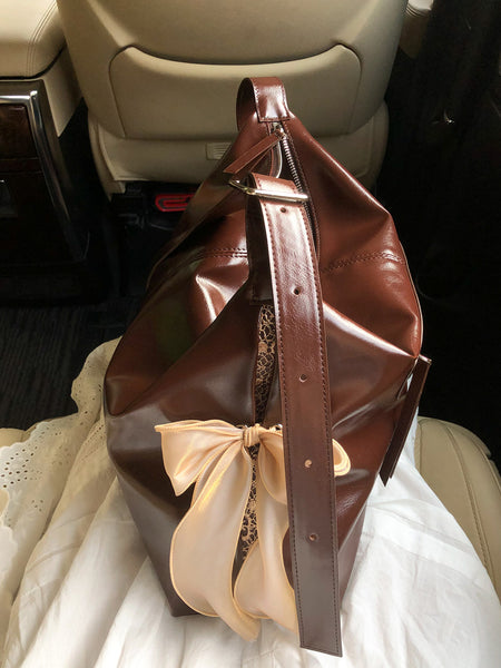 [ovuni] PILLOW RIBBON BAG (BROWN)