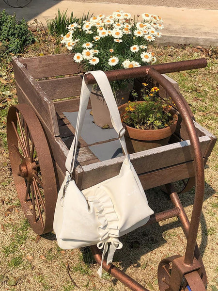 [ovuni] RUFFLE ENVELOPE BAG IVORY