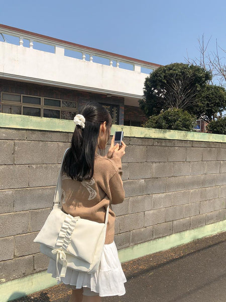 [ovuni] RUFFLE ENVELOPE BAG IVORY