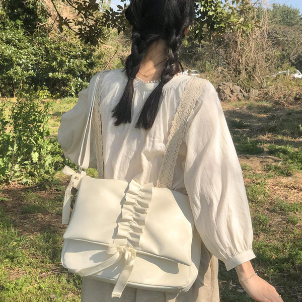 [ovuni] RUFFLE ENVELOPE BAG IVORY
