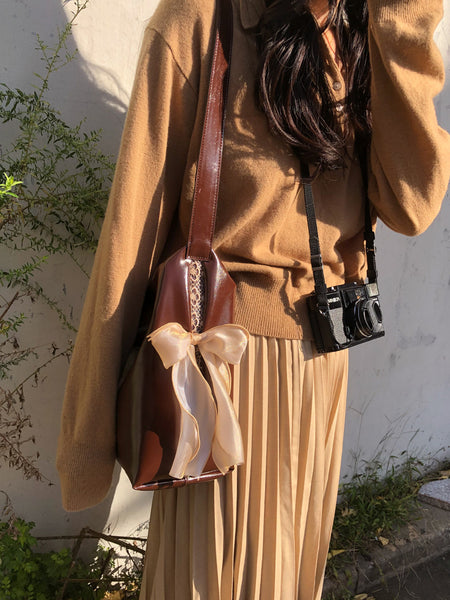 [ovuni] PILLOW RIBBON BAG (BROWN)