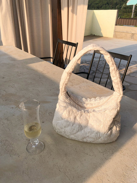 [ovuni] QUILTED HOBO BAG - SATIN IVORY